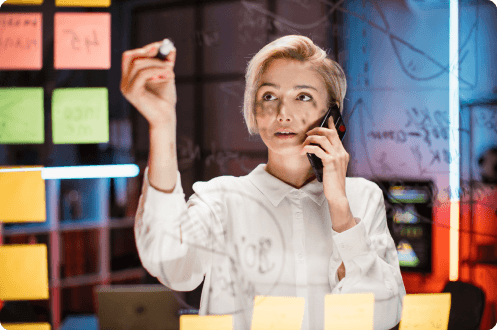 pretty businesswoman writing on glass board at mod 2023 11 27 04 56 30 utc 1 1