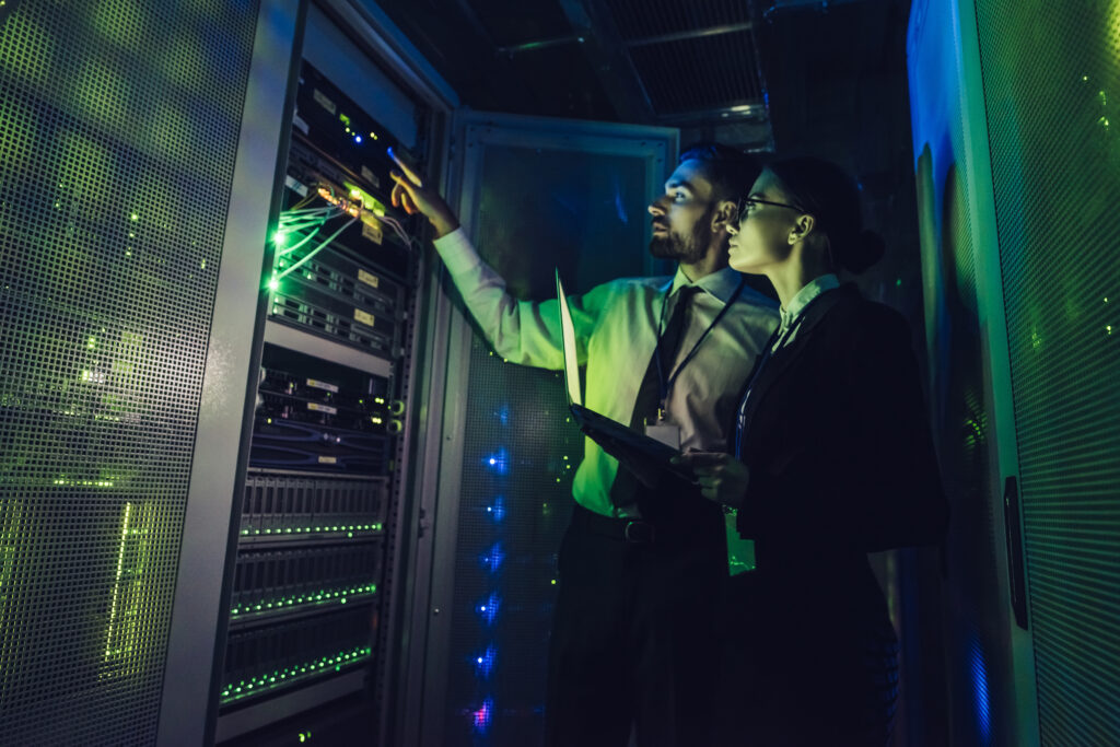 Man and woman in data centre